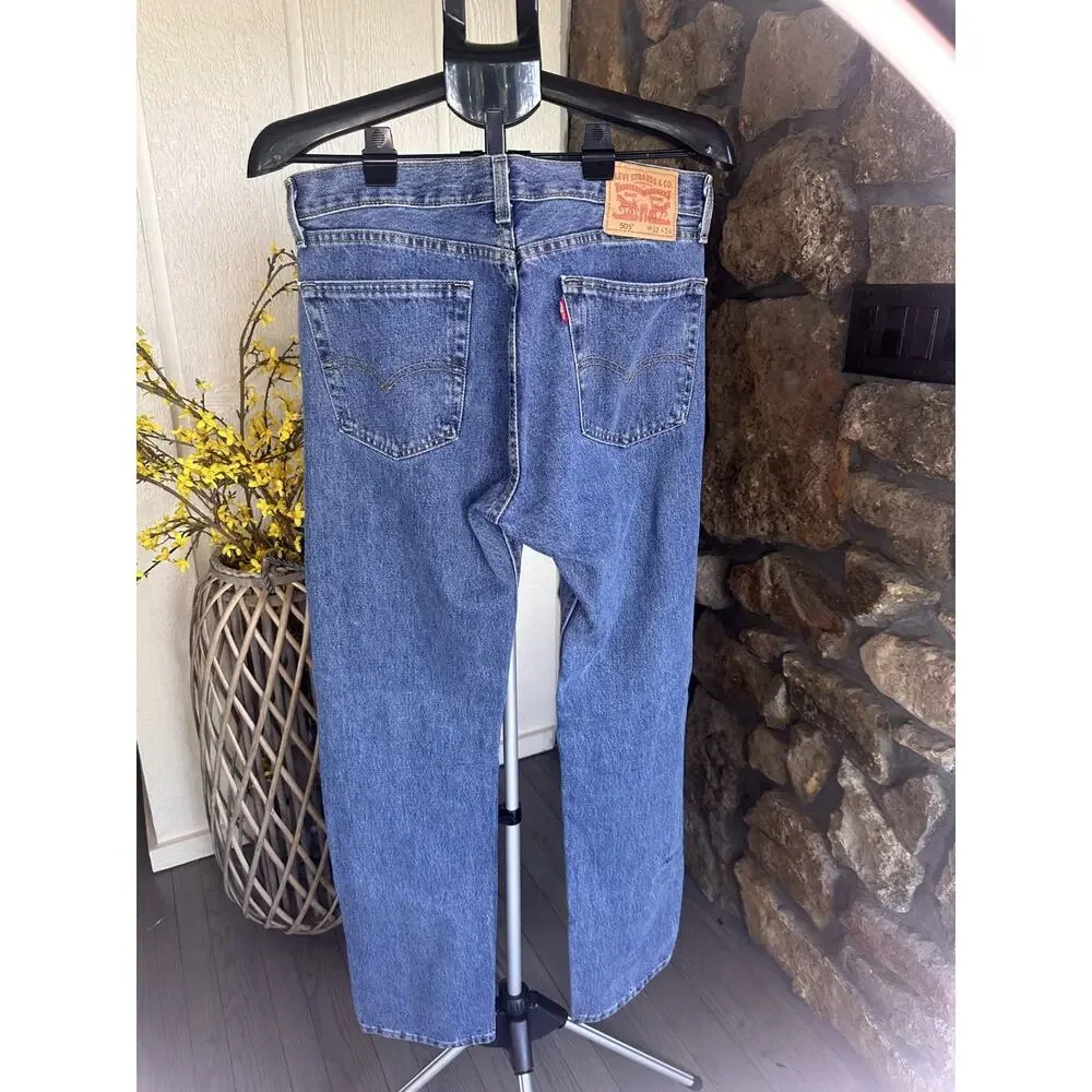 Levi's 505 Men’s Blue Medium Wash Straight Regular Fit Denim Jeans. 32x34